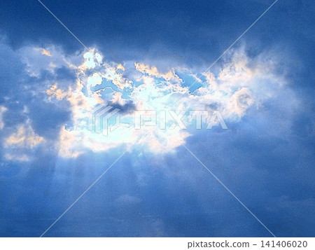 A ray of hope shining through the gaps in the clouds and a blue sky A ray of hope shining through the gaps in the clouds and a blue sky 141406020