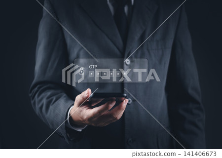 Businessman hand holding smartphone with OTP (One Time Password) verification code on virtual screen. Concept of two-factor authentication, mobile banking security, and secure digital login. 141406673