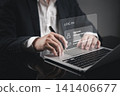 Businessman hand typing on laptop with virtual login interface showing username and password fields. Concept of secure user authentication, digital account access, and cybersecurity. 141406677