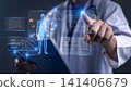 Medical doctor touching virtual holographic interface showing human anatomy and vital signs data. Concept of futuristic healthcare technology, AI diagnosis, and digital medical analysis. 141406679