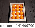 High-quality Boshu loquats in a wooden box 141406790
