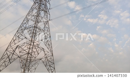 high voltage tower at sunset 141407330