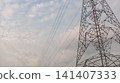high voltage tower at sunset 141407333
