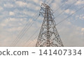 high voltage pole with clouds 141407334