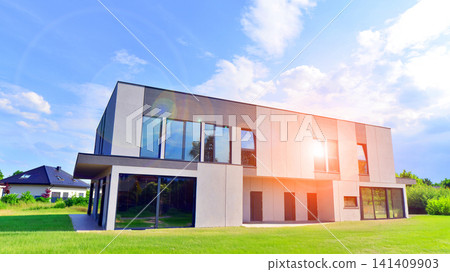 Modern rectangular minimalist semi detached house for families. Modern design, technology, and real estate market concept. Modern rectangular minimalist semi detached house for families. Modern design, technology, and real estate market concept. 141409903