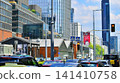 Warsaw, Poland. 20 May 2026. City center with cars and buildings in the background. Car traffic at rush hour in downtown area of the city.  141410758