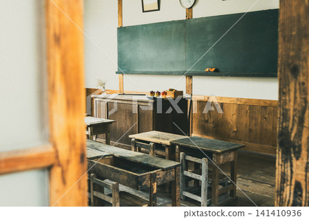 A blackboard in a classroom of an old wooden Japanese elementary school, a Showa-era retro style. A blackboard in a classroom of an old wooden Japanese elementary school, a Showa-era retro style. 141410936