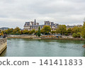 Hotel de Ville in Paris, France, iconic architecture reflecting in Seine river water on an autumn day 141411833