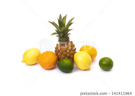 Pineapple with lemon and lime and oranges on a white background. Group of citrus fruits close-up. Lime green, pineapple, orange orange, lemon close-up on an isolated white background. Pineapple with lemon and lime and oranges on a white background. Group of citrus fruits close-up. Lime green, pineapple, orange orange, lemon close-up on an isolated white background. 141411964