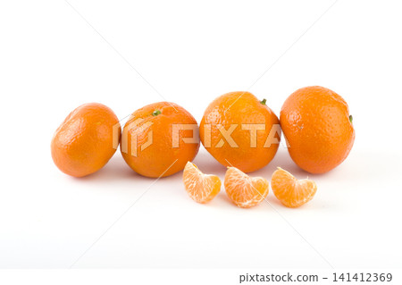 fresh mandarines isolated on white background. Oranges are arranged in rows. Placed on a white background. fresh mandarines isolated on white background. Oranges are arranged in rows. Placed on a white background. 141412369