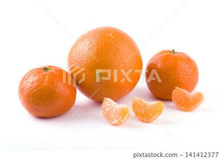 fresh mandarines isolated on white background. Oranges are arranged in rows. Placed on a white background. fresh mandarines isolated on white background. Oranges are arranged in rows. Placed on a white background. 141412377