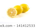 Lemons with leaves on a white background. Fresh lemons on a white background. 141412533