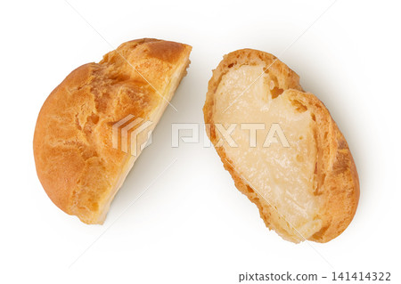profiterole with cream isolated on a white background. Top view. Flat lay. profiterole with cream isolated on a white background. Top view. Flat lay. 141414322