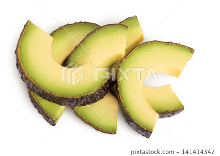 avocado pieces isolated on white background close up. Top view. Flat lay avocado pieces isolated on white background close up. Top view. Flat lay 141414342