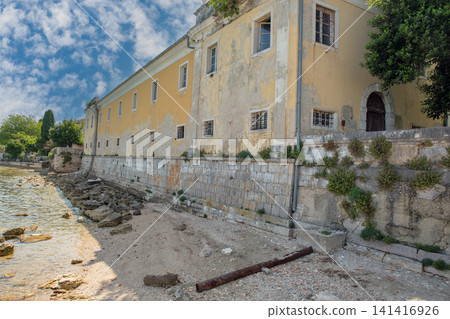 Historic seaside facade of Dajla monastery in Istria, Croatia. Historic seaside facade of Dajla monastery in Istria, Croatia. 141416926