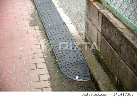 Step plate to eliminate the step at the entrance to the parking lot. Step plate to eliminate the step at the entrance to the parking lot. 141417302