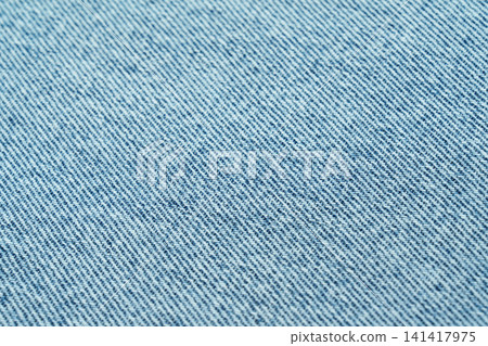 A sample of blue denim fabric. A sample of blue denim fabric. 141417975