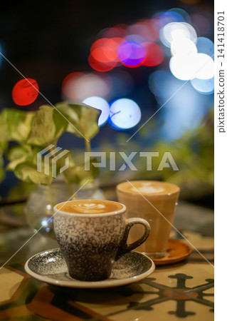 Cozy Coffee Shop Scene with Artisan Latte in Ceramic and Glass Cups Cozy Coffee Shop Scene with Artisan Latte in Ceramic and Glass Cups 141418701