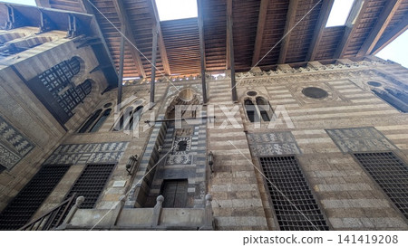 Traditional Mamluk Architecture and Intricate Stone Facade in Cairo Egypt Traditional Mamluk Architecture and Intricate Stone Facade in Cairo Egypt 141419208