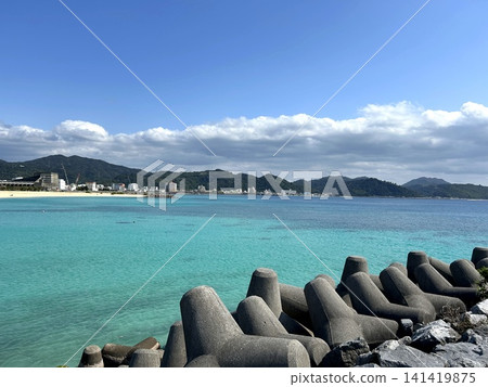 The crystal-clear waters of Okinawa viewed over the tetrapods The crystal-clear waters of Okinawa viewed over the tetrapods 141419875