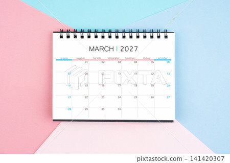 March month desk calendar for 2027 year on colorful background. Flat lay. March month desk calendar for 2027 year on colorful background. Flat lay. 141420307