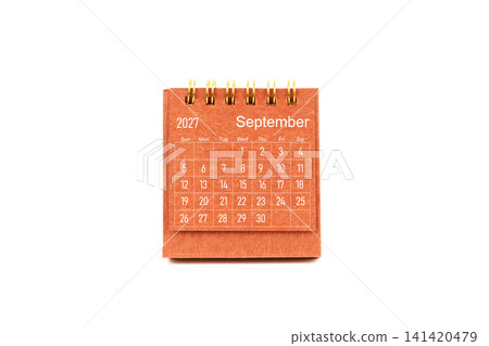 September 2027. Front view of mini desk calendar on white. September 2027. Front view of mini desk calendar on white. 141420479