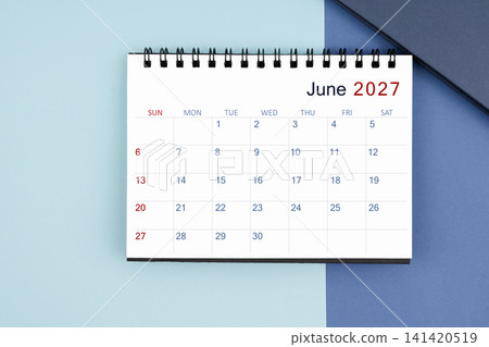June 2027 monthly desk calendar for 2025 year on blue background. June 2027 monthly desk calendar for 2025 year on blue background. 141420519