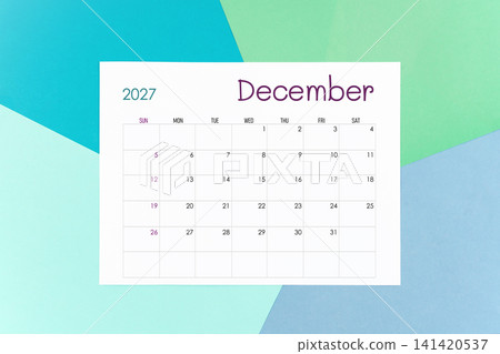 December calendar card for 2027 year on colorful background. Flat lay. December calendar card for 2027 year on colorful background. Flat lay. 141420537