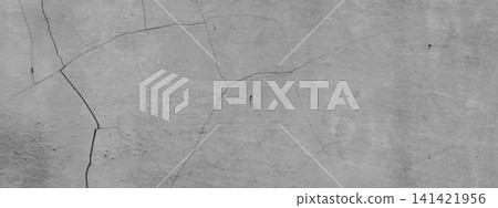 Gray cement and plaster wall texture with fine cracks. Gray cement and plaster wall texture with fine cracks. 141421956