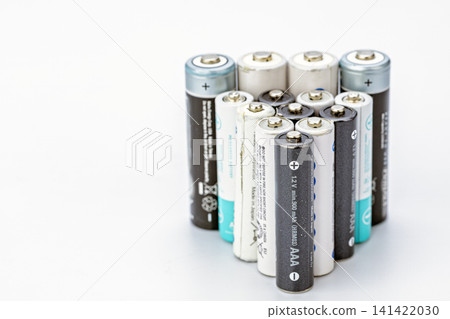 Close-Up Collection of Mixed AAA and AA Alkaline and Rechargeable Batteries Grouped Together on a Clean White Background Showing Various Brands and Conditions Close-Up Collection of Mixed AAA and AA Alkaline and Rechargeable Batteries Grouped Together on a Clean White Background Showing Various Brands and Conditions 141422030