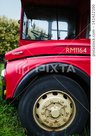 A classic red double-decker London bus on display. A classic red double-decker London bus on display. 141422100