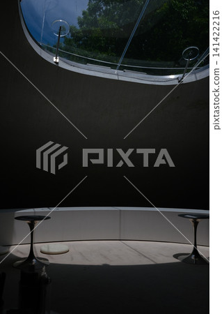 A serene and beautiful artistic space, woven together by natural light from the skylight and deep shadows. A serene and beautiful artistic space, woven together by natural light from the skylight and deep shadows. 141422216