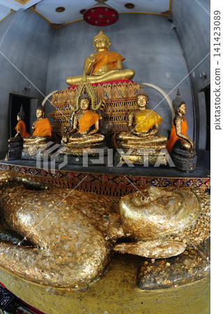 "Luang Pho Phra Non," in Wat Phra Non temple a stone-carved Buddha image in the reclining posture. Its appearance is unique compared to others: it is a Buddha image lying on its back. "Luang Pho Phra Non," in Wat Phra Non temple a stone-carved Buddha image in the reclining posture. Its appearance is unique compared to others: it is a Buddha image lying on its back. 141423089