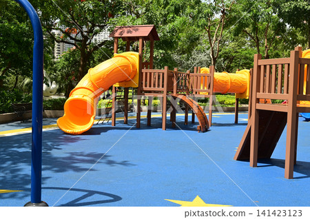Climbing structures and slides are playground equipment for children, which are part of the public park in Bangkok capital city , Thailand. Climbing structures and slides are playground equipment for children, which are part of the public park in Bangkok capital city , Thailand. 141423123