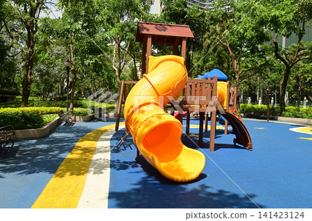 Climbing structures and slides are playground equipment for children, which are part of the public park in Bangkok capital city , Thailand. Climbing structures and slides are playground equipment for children, which are part of the public park in Bangkok capital city , Thailand. 141423124