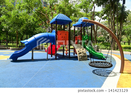 Climbing structures and slides are playground equipment for children, which are part of the public park in Bangkok capital city , Thailand. Climbing structures and slides are playground equipment for children, which are part of the public park in Bangkok capital city , Thailand. 141423129
