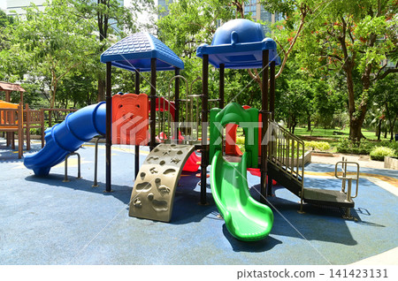 Climbing structures and slides are playground equipment for children, which are part of the public park in Bangkok capital city , Thailand. Climbing structures and slides are playground equipment for children, which are part of the public park in Bangkok capital city , Thailand. 141423131