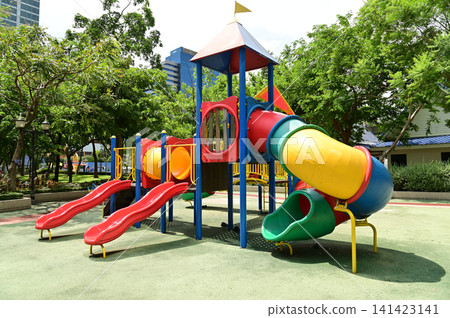 Climbing structures and slides are playground equipment for children, which are part of the public park in Bangkok capital city , Thailand. Climbing structures and slides are playground equipment for children, which are part of the public park in Bangkok capital city , Thailand. 141423141
