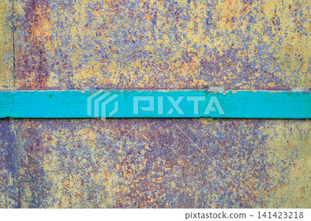 Rusted metal plate texture with green horizontal metal stripe. Weathered iron surface and vintage corrosion material background. Rusted metal plate texture with green horizontal metal stripe. Weathered iron surface and vintage corrosion material background. 141423218