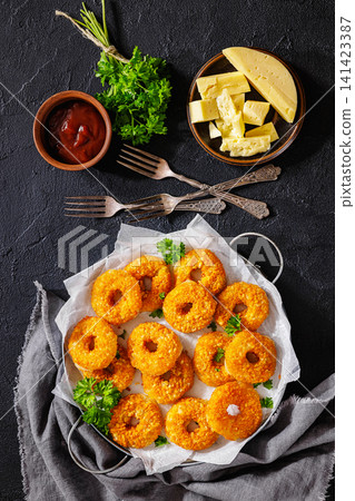 Golden Cheddar Rings With Tomato Ketchup 141423387
