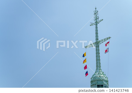 The former Kobe Port signal station in Kobe Harborland, where international signal flags stand out against the summer blue sky. The former Kobe Port signal station in Kobe Harborland, where international signal flags stand out against the summer blue sky. 141423746