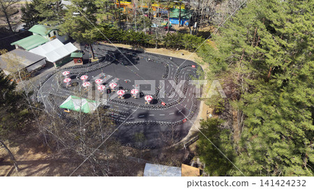 Aerial view of an amusement park's go-kart track Aerial view of an amusement park's go-kart track 141424232
