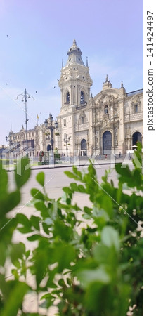 Lima's historic cathedral seen through green foliage Lima's historic cathedral seen through green foliage 141424497