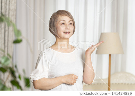 Portrait of a senior woman, natural light Portrait of a senior woman, natural light 141424889