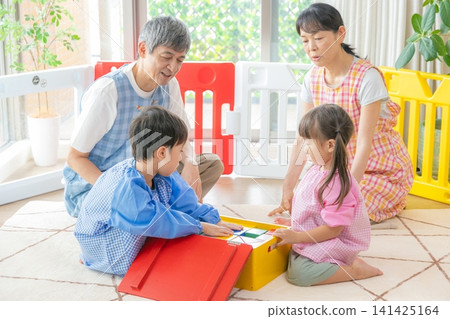 A veteran senior childcare worker and a child A veteran senior childcare worker and a child 141425164