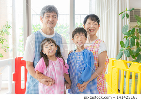 A veteran senior childcare worker and a child A veteran senior childcare worker and a child 141425165