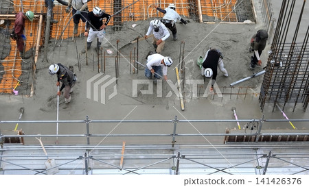 Slab concrete pouring status (floor work) in an apartment building. Slab concrete pouring status (floor work) in an apartment building. 141426376
