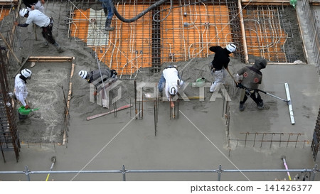 Slab concrete pouring status (floor work) in an apartment building. Slab concrete pouring status (floor work) in an apartment building. 141426377