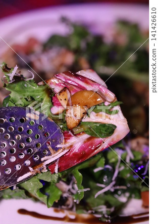 Salad with Radicchio and Mushrooms in Strainer Salad with Radicchio and Mushrooms in Strainer 141426610