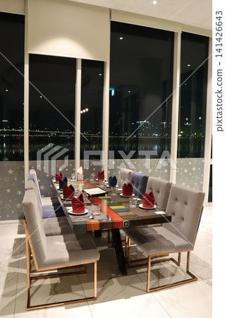 Modern Dining Room with City View at Night Modern Dining Room with City View at Night 141426643